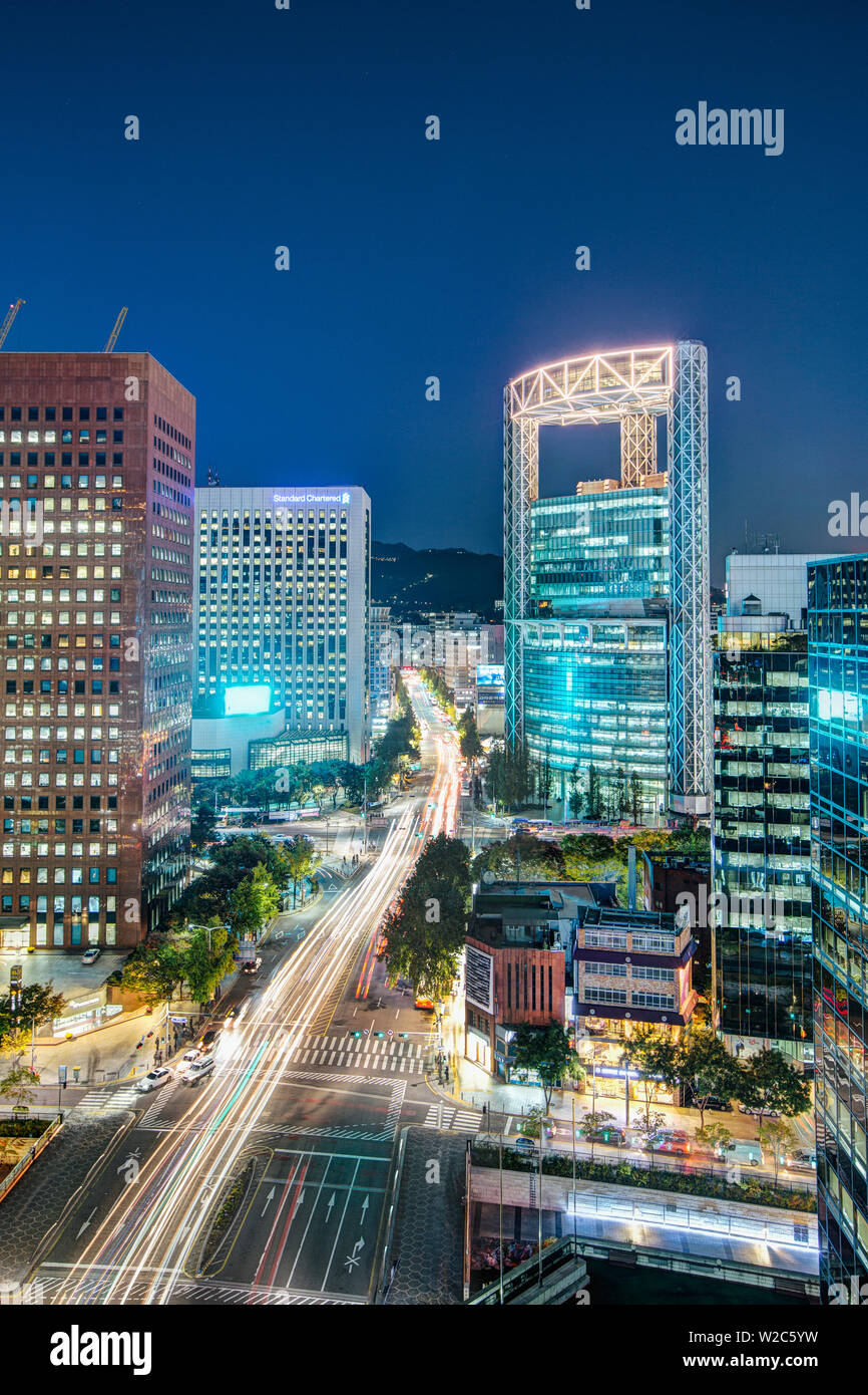 Busy Namdaemun-ro at dusk in Myeong-dong, Myeongdong, Seoul, South Korea Stock Photo