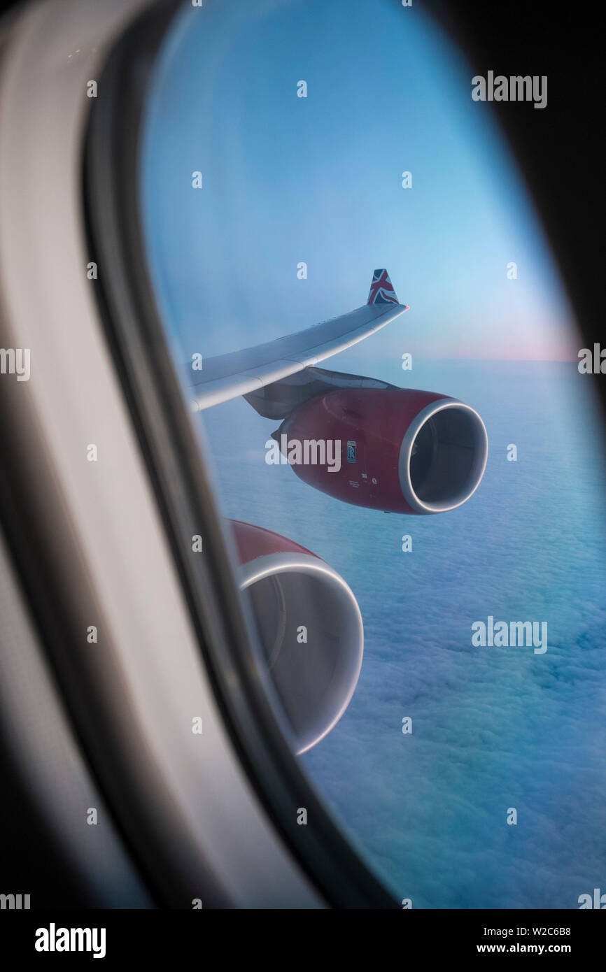Airbus A340, view out of the window with engine and wing Stock Photo