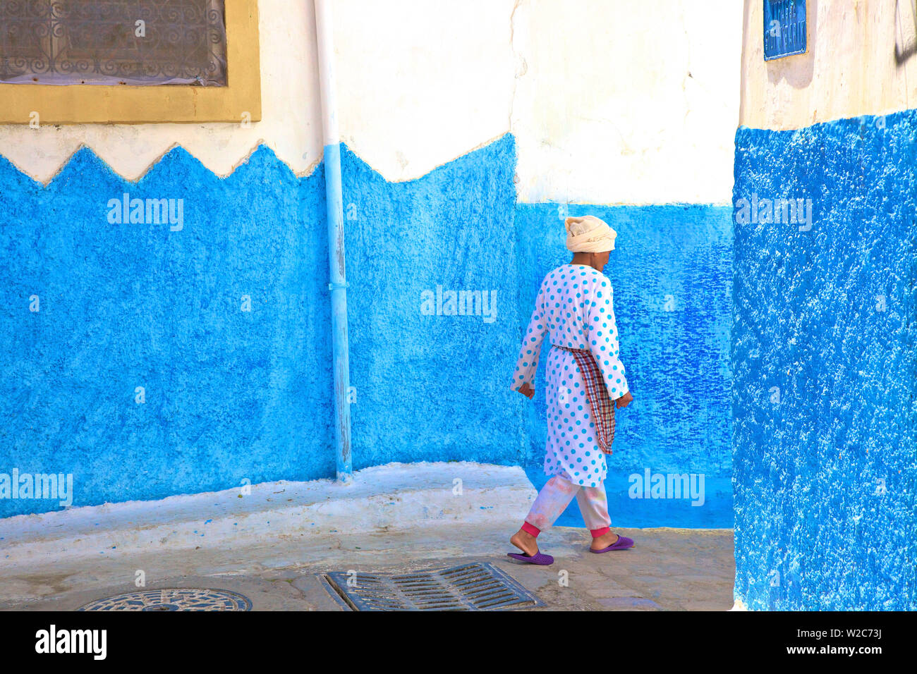 Person Walking In Oudaia Kasbah, Rabat, Morocco, North Africa Stock Photo