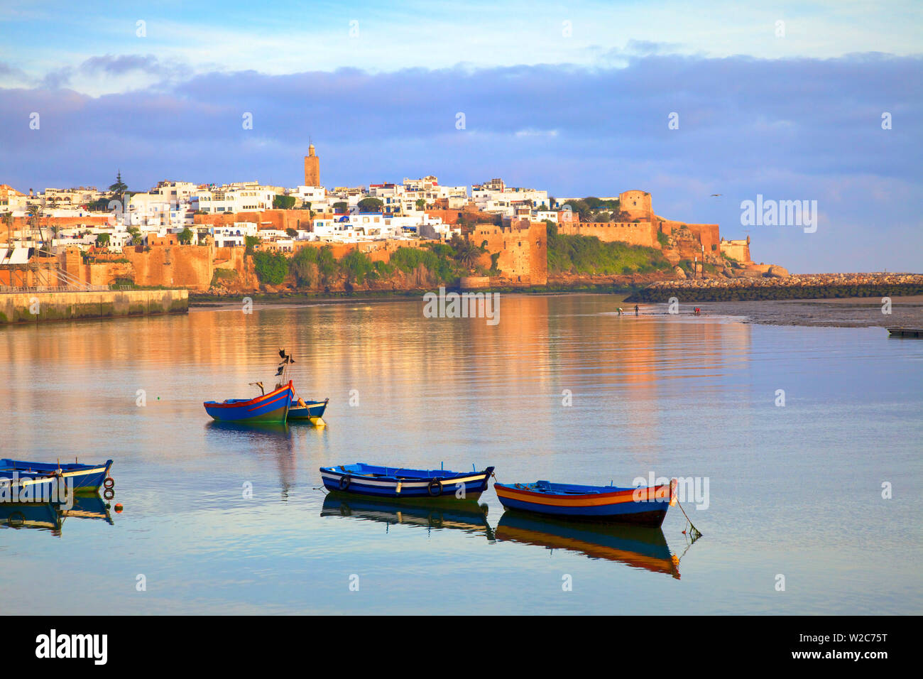 Harbour and Fishing Boats with Oudaia Kasbah and Coastline in Background, Rabat, Morocco, North Africa Stock Photo
