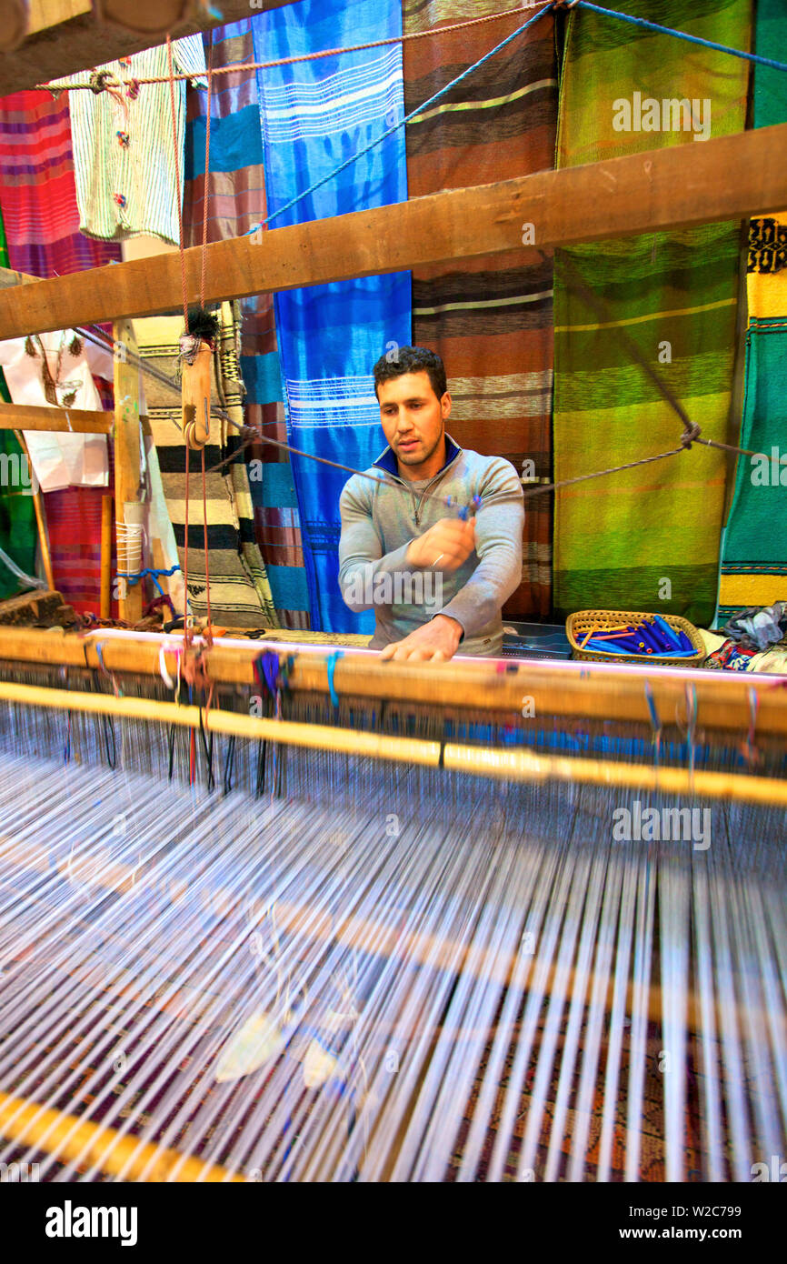 Man Weaving to Produce Traditional Scarves, Tangier, Morocco, North Africa Stock Photo