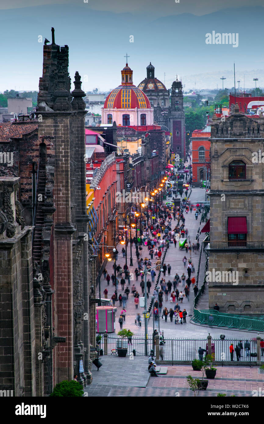 Mexico, Mexico City, Emiliano Zapata Street, Pedestrian Way, Dusk, Centro Historico, Red Dome of Iglesia de la Santisima Trinidad Stock Photo