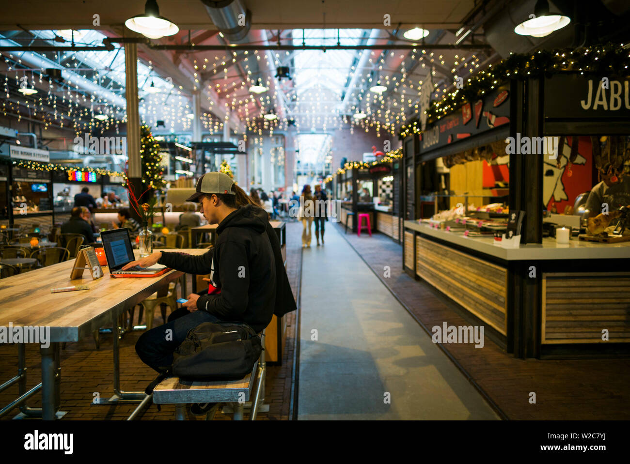 Netherlands, Amsterdam, De Hallen, new food hall in renovated tram depot, food court Stock Photo