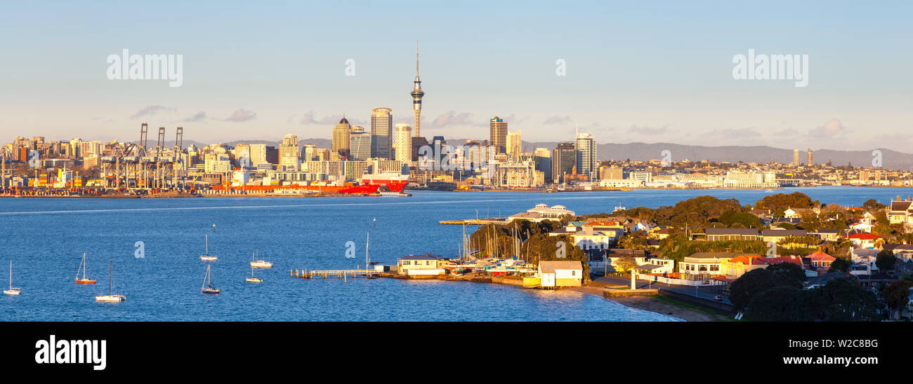 Elevated View Over Devenport towards CBD illuminated at sunrise, Auckland, New Zealand Stock Photo