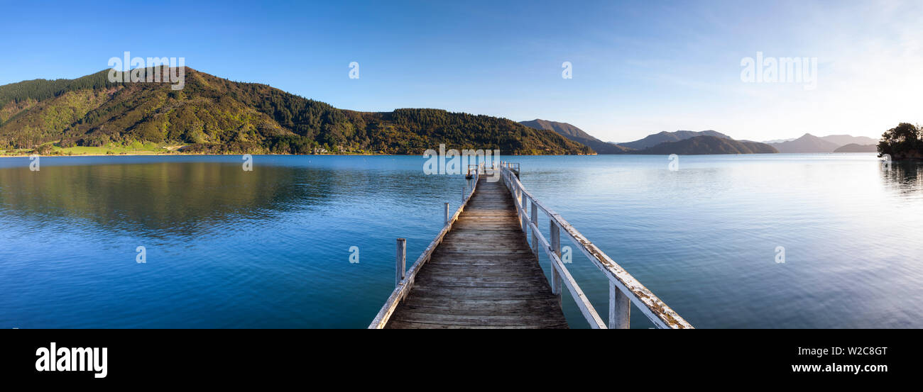 Picturesque wharf in the idyllic Kenepuru Sound, Marlborough Sounds, South Island, New Zealand Stock Photo