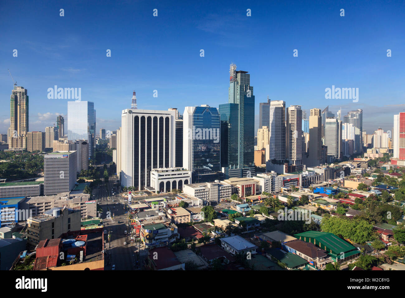 Philippines, Manila, Makati Business District, Makati Avenue and City Skyline Stock Photo