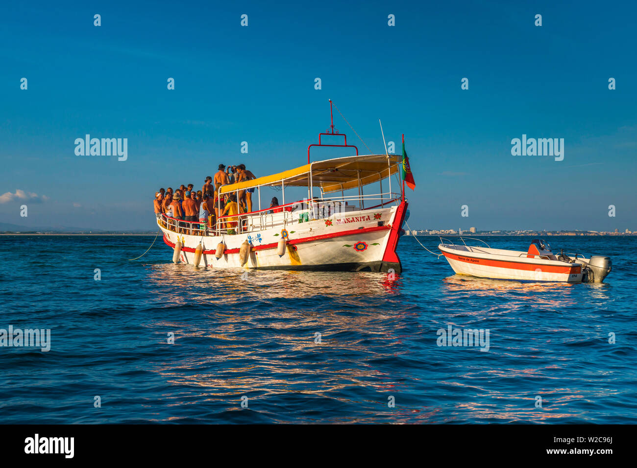 Portugal, Algarve, Lagos, Ponta da Piedade, Party Boat Stock Photo