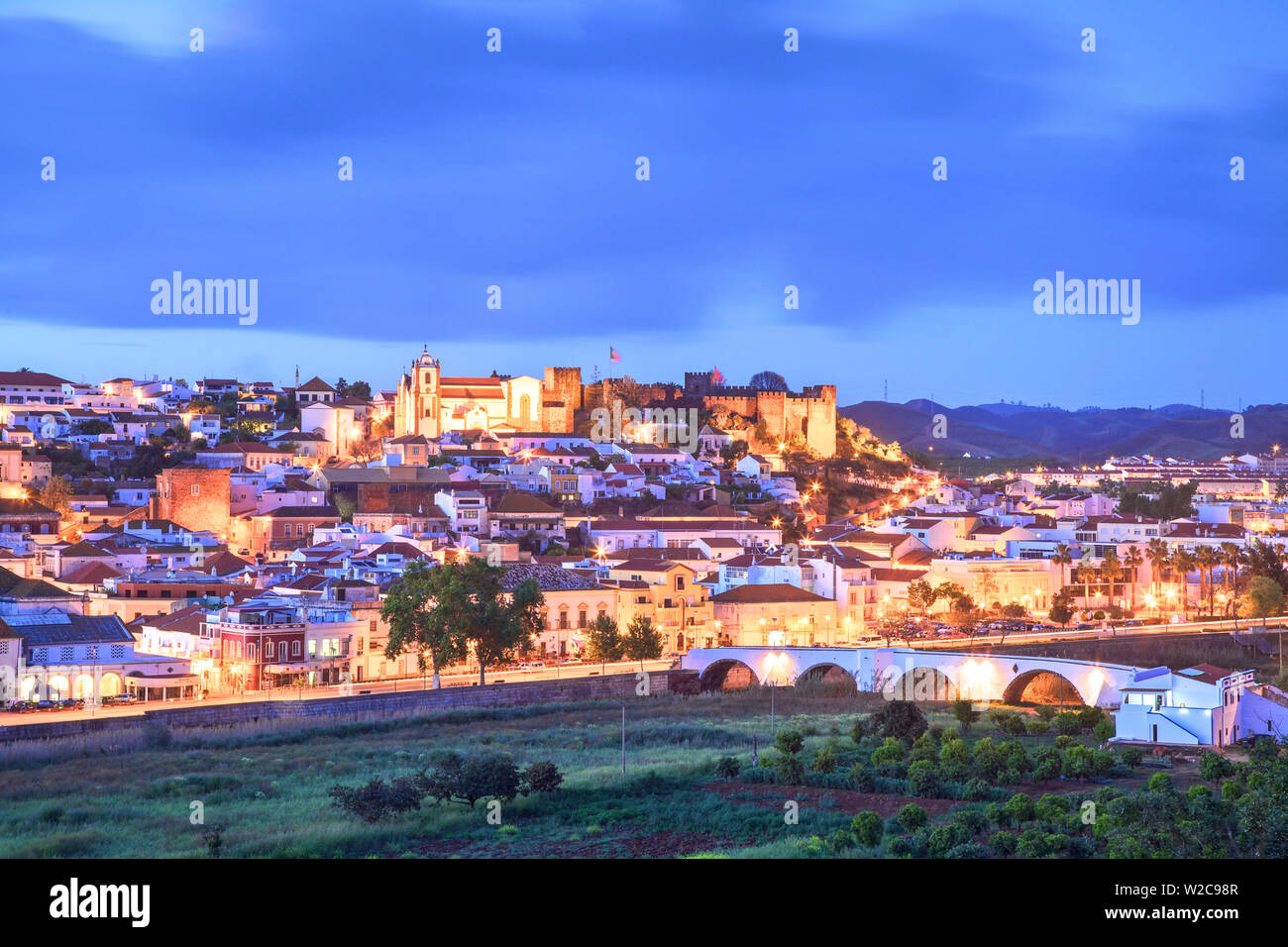 Old Cathedral and Castle at Dusk, Silves, Western Algarve, Algarve, Portugal, Europe Stock Photo