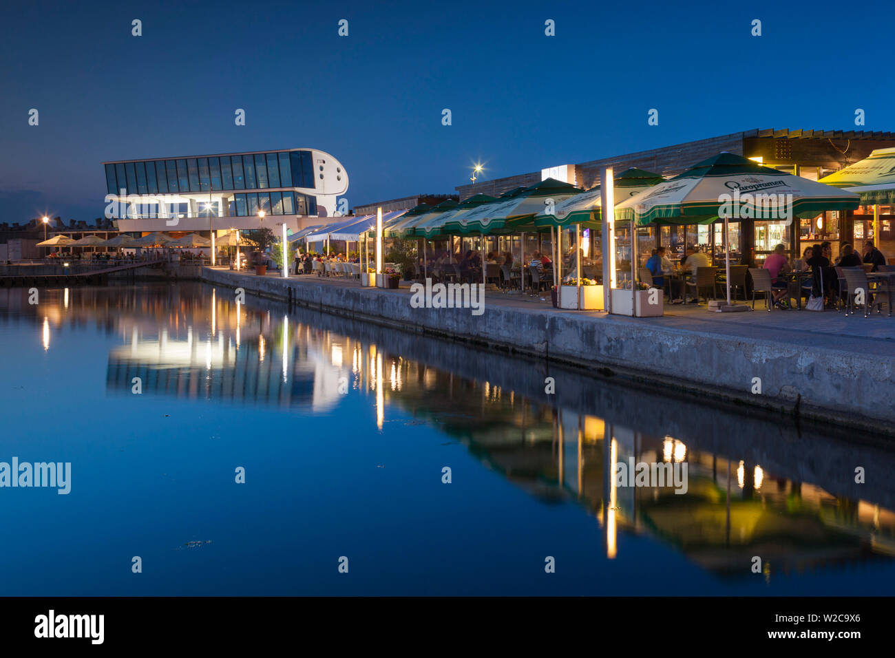 Romania, Black Sea Coast, Constanta, Tomis Tourist Port and Marina,  waterfront cafes, dusk Stock Photo - Alamy