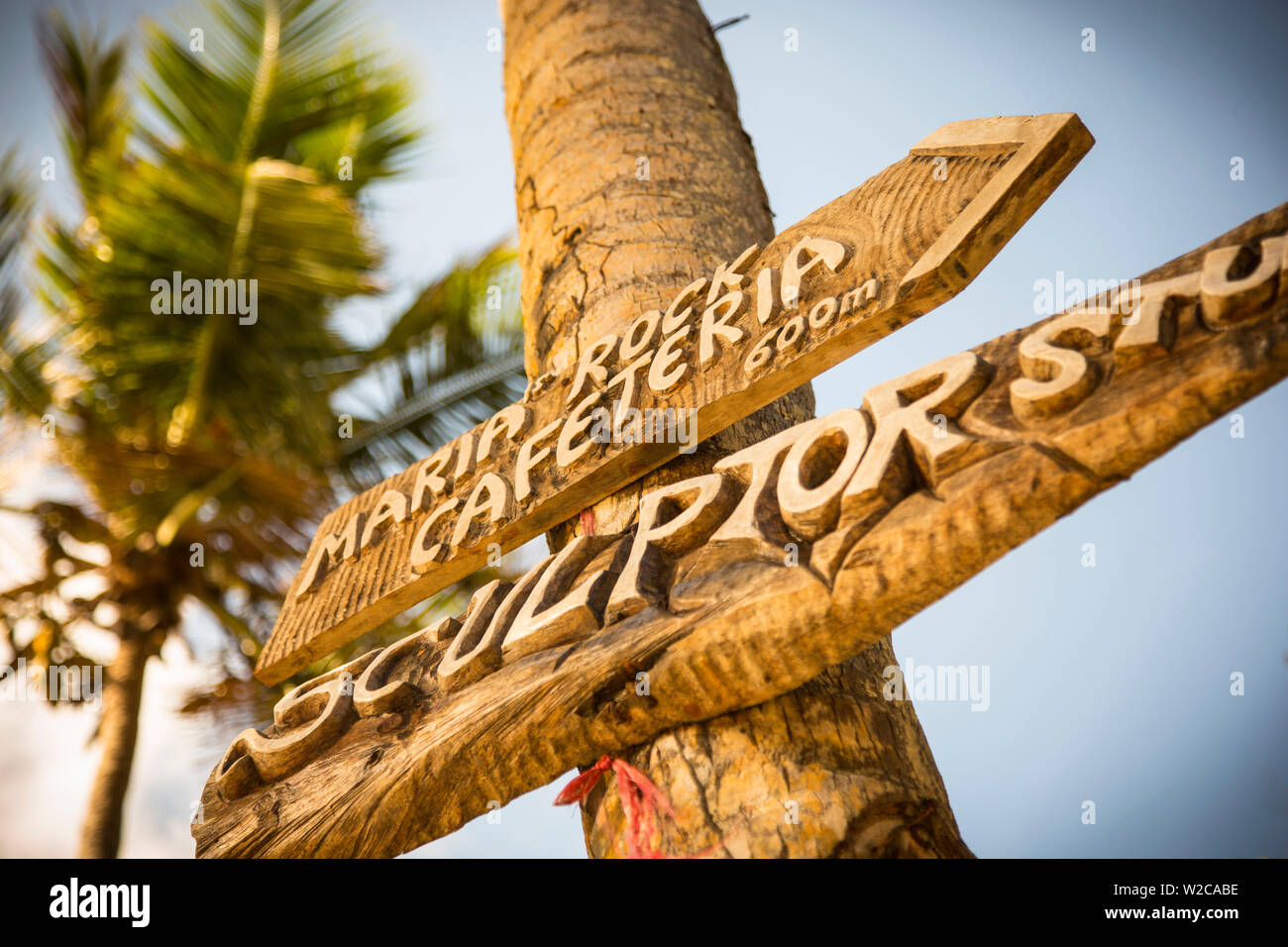 Sign on palm tree, Mahe, Seychelles Stock Photo