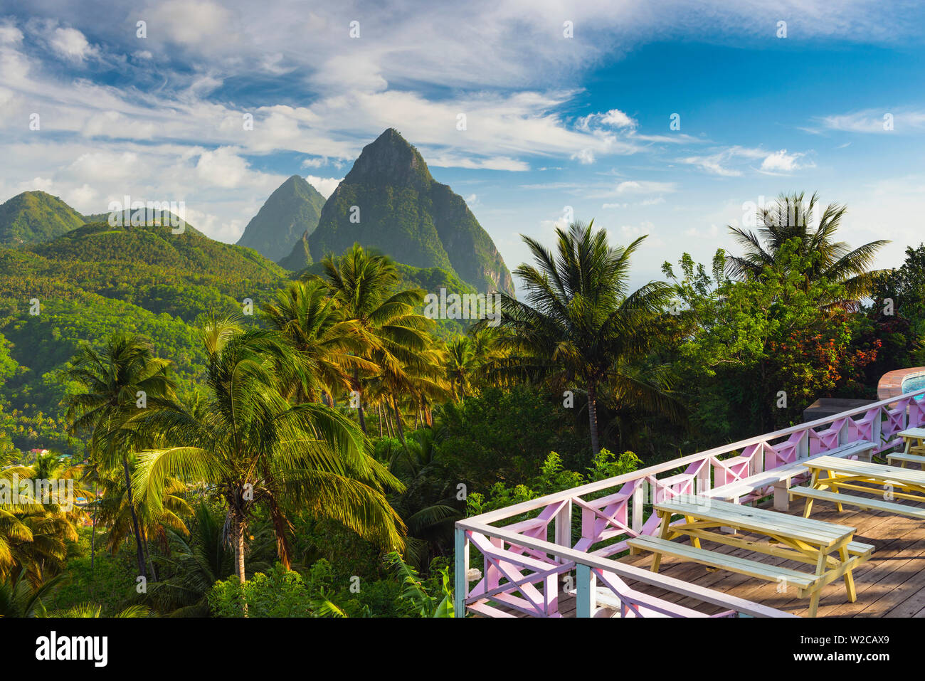 Caribbean, St Lucia, Petit (near) and Gros Piton Mountains (UNESCO World Heritage Site) above town of Soufriere, from La Haut Hotel and Resort Stock Photo