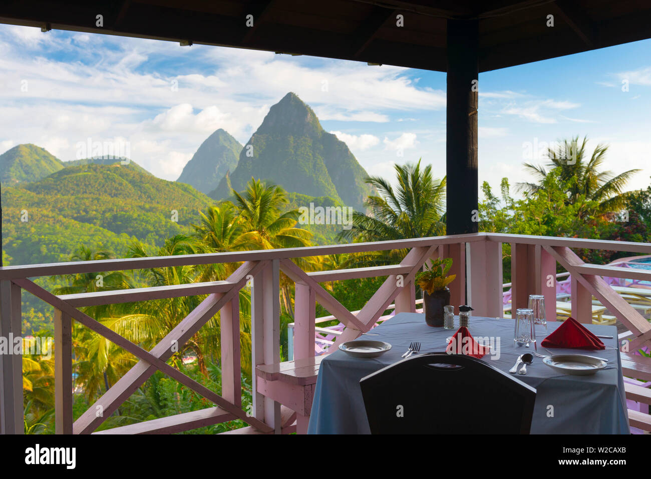 Caribbean, St Lucia, Petit (near) and Gros Piton Mountains (UNESCO World Heritage Site) above town of Soufriere, from La Haut Hotel and Resort Stock Photo