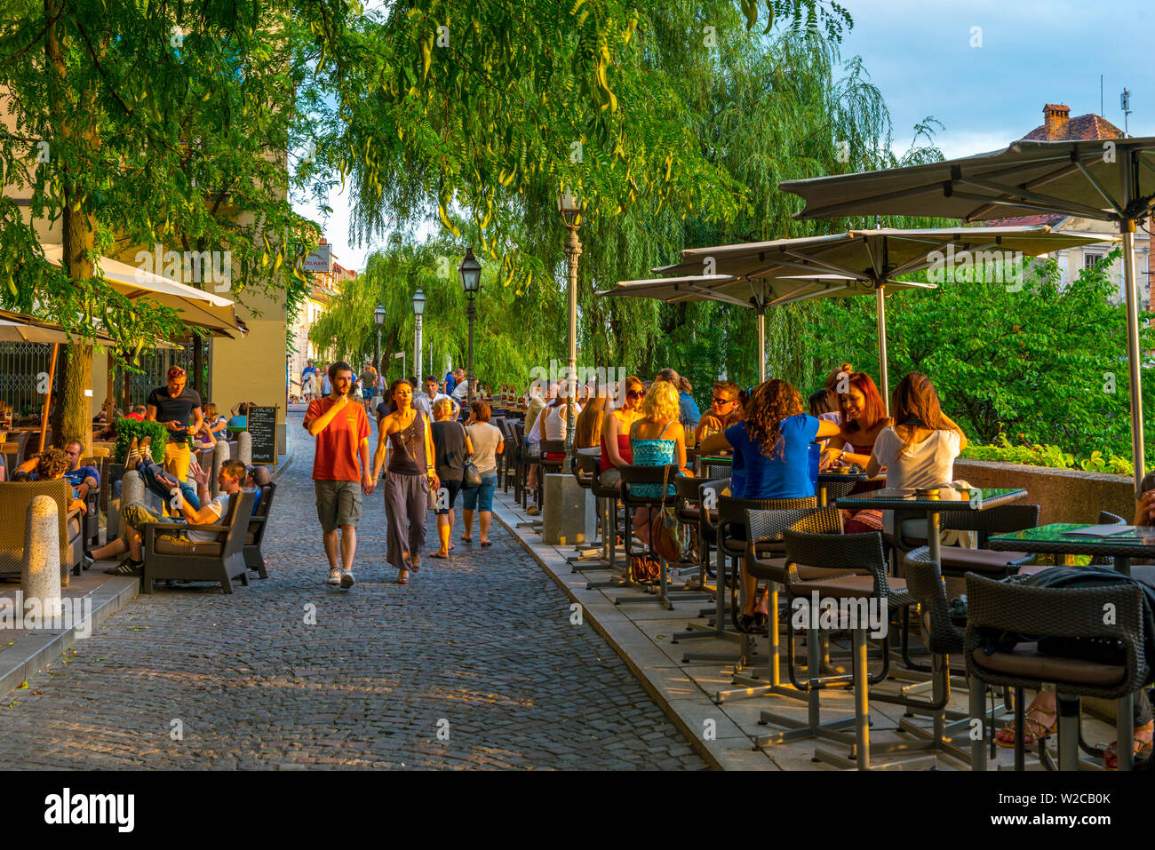 Slovenia, Ljubljana, Old Town, Cankarevo nabrezje beside Ljubljanica River, Cafes Stock Photo