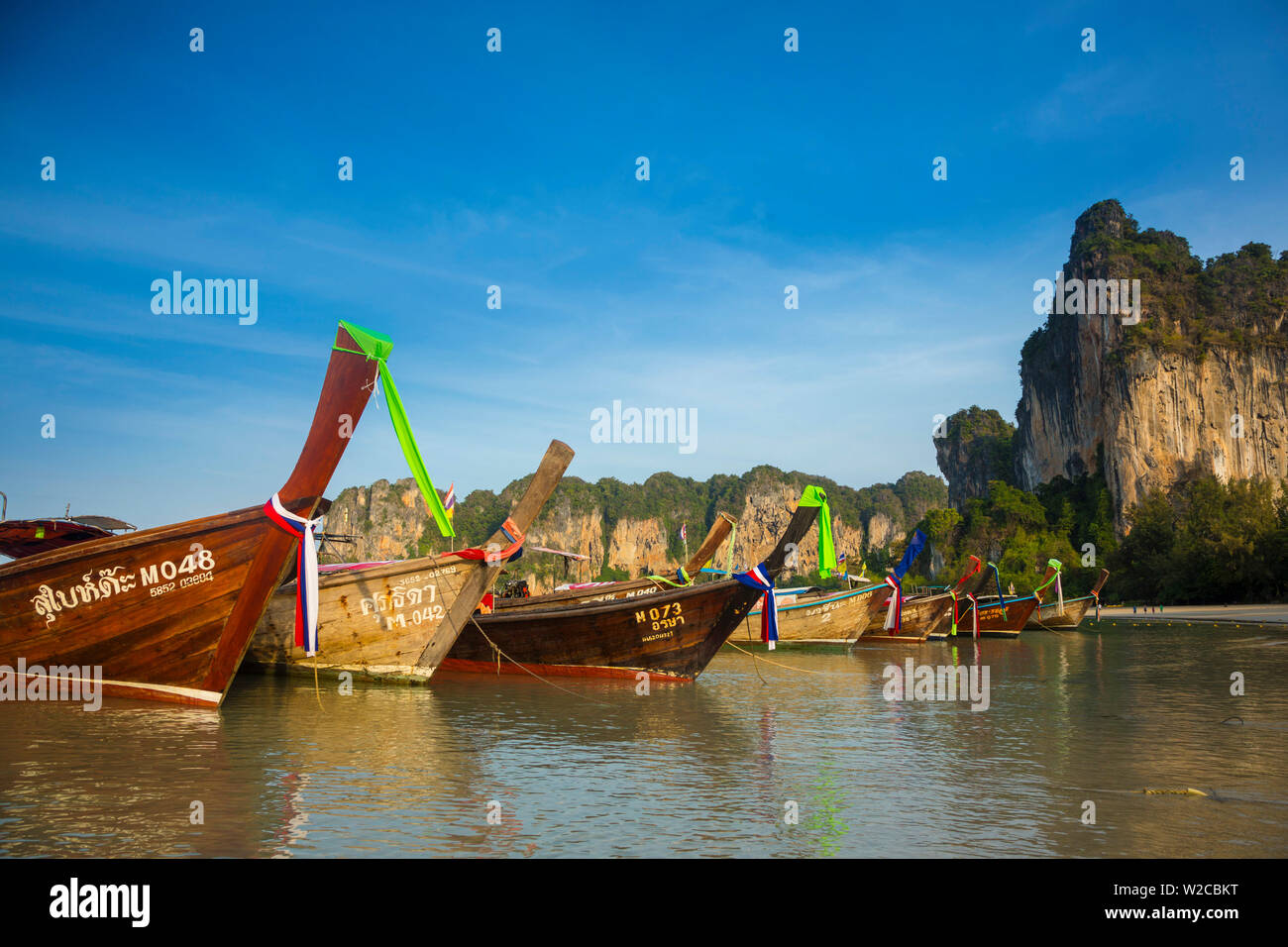 Longtail boats on West Railay beach, Railay Peninsula, Krabi Province, Thailand Stock Photo