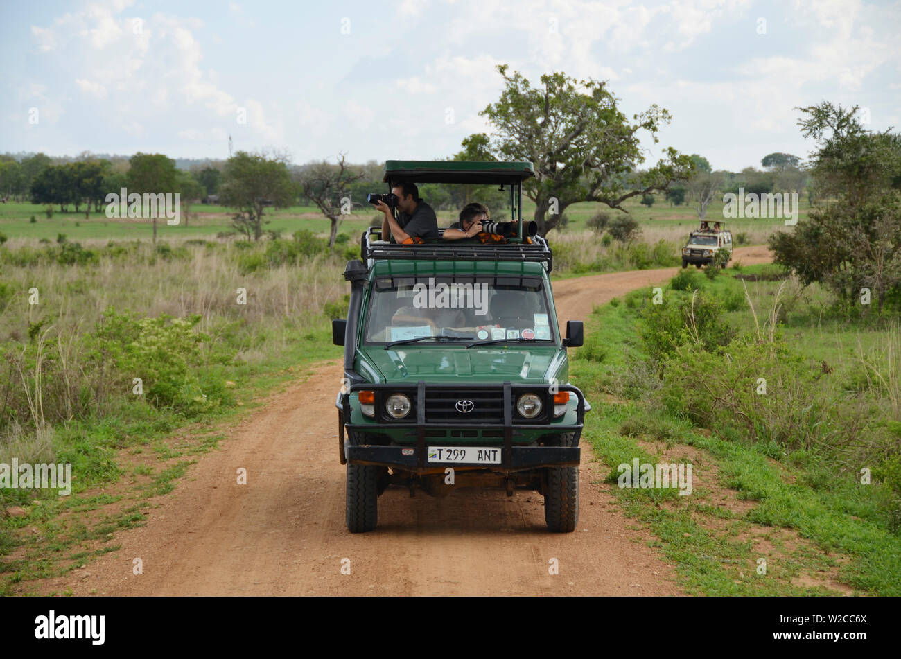 Safari vehicle with tourists in Mikumi National Park, Tanzania Stock Photo
