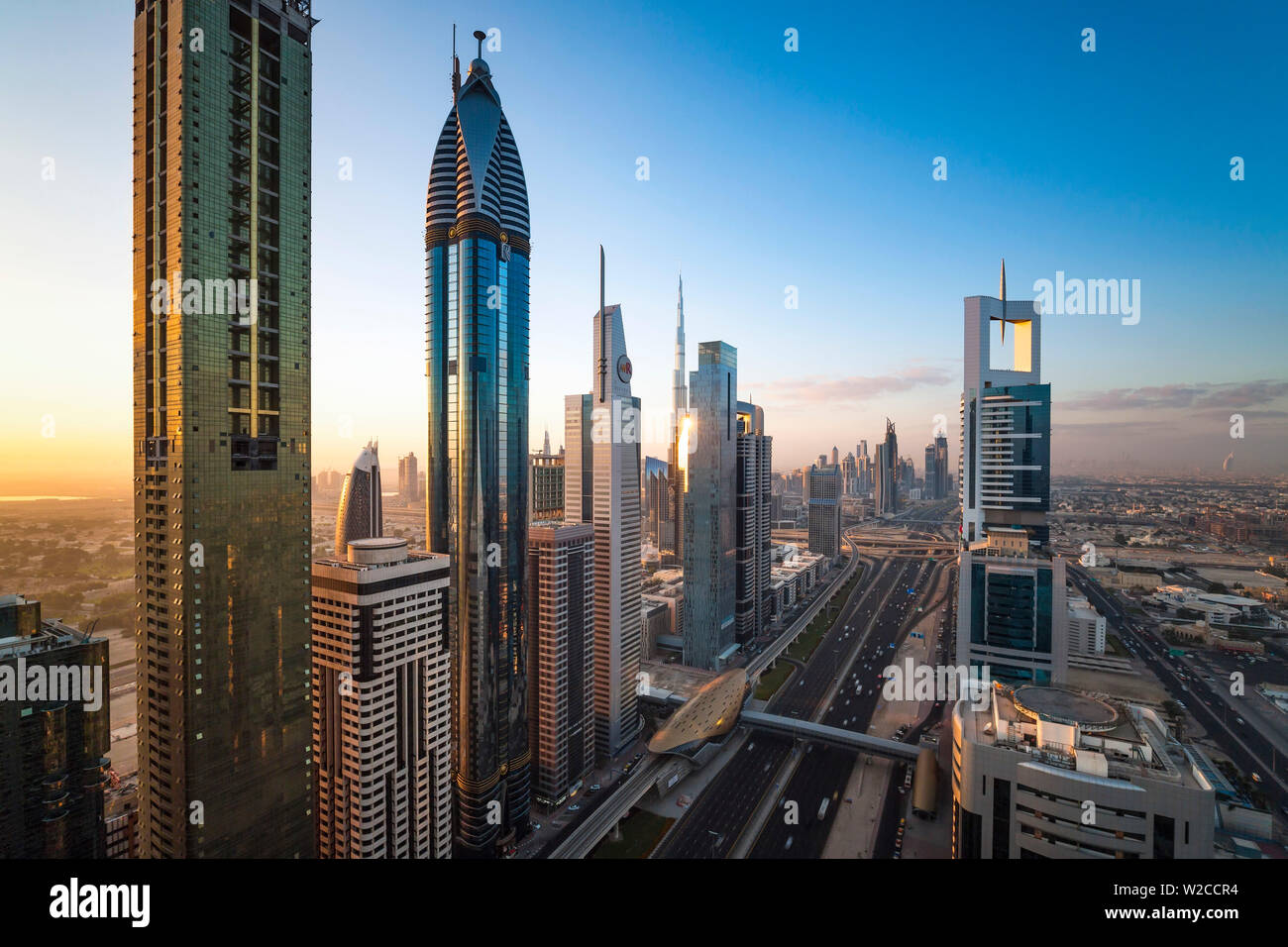 United Arab Emirates, Dubai, Sheikh Zayed Rd, traffic and new high rise buildings along Dubai's main road Stock Photo