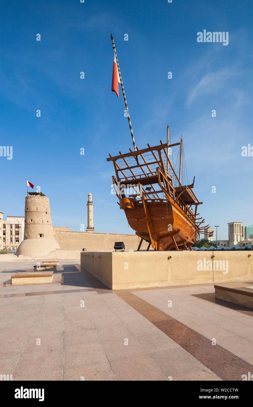 UAE, Dubai, Bur Dubai, Dubai Museum, exterior with traditional Dhow ship Stock Photo
