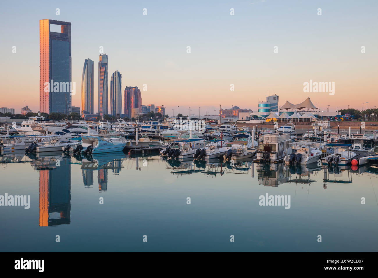 United Arab Emirates, Abu Dhabi, View of Marina and City skyline looking towards Abu Dhabi National Oil Company headquarters, Etihad Towers, The Royal Rose Hotel and to the right the Abu Dhabi International Marine Sports Club Stock Photo