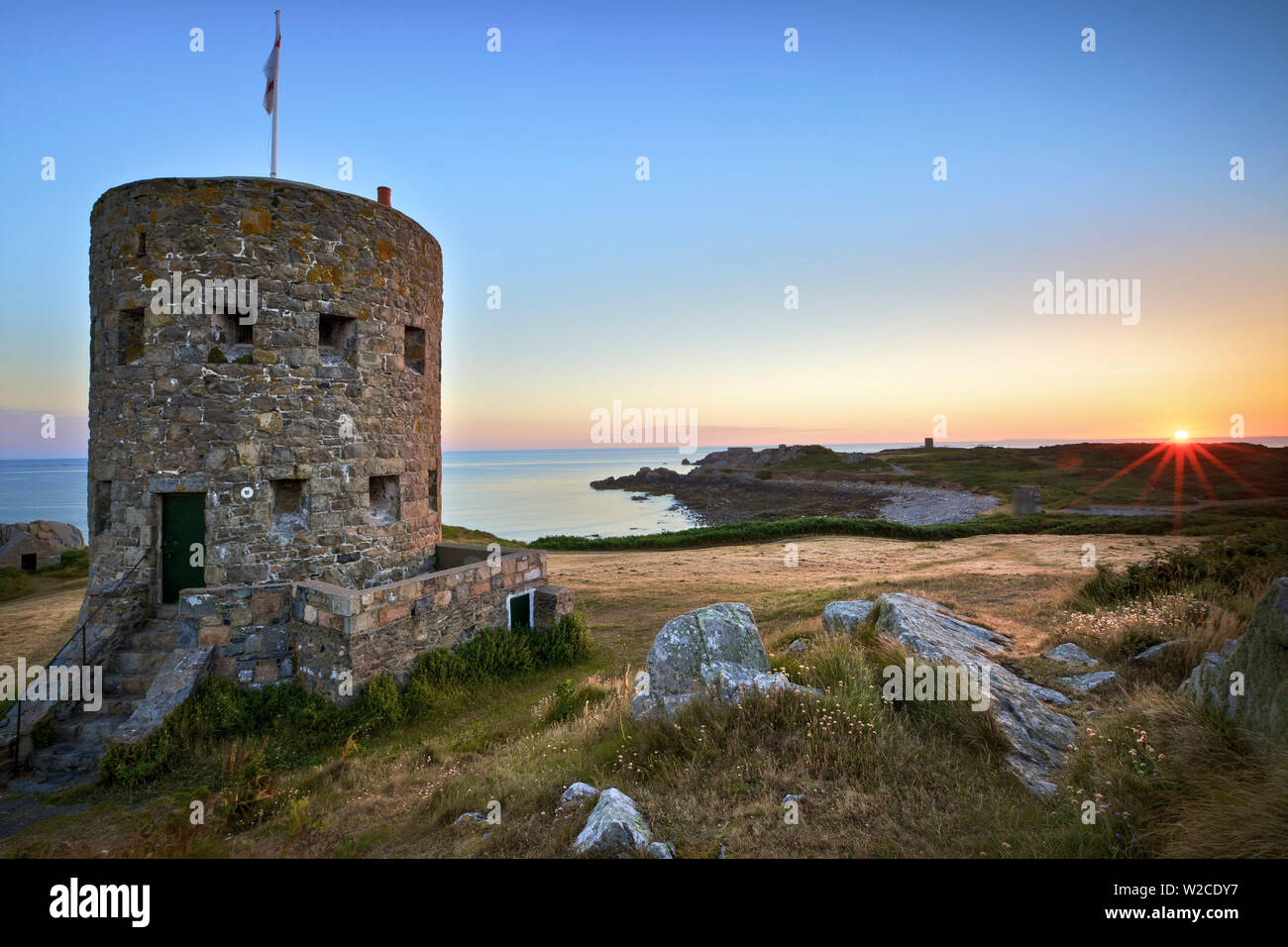 Sunrise At Martello Tower No 5, L'Ancresse Bay, Guernsey, Channel Islands Stock Photo