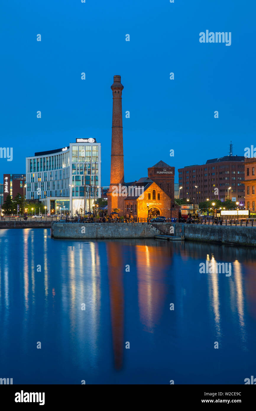 United Kingdom, England, Merseyside, Liverpool, Canning Dock, View of docks looking towards the Pump House and Hilton Hotel Stock Photo