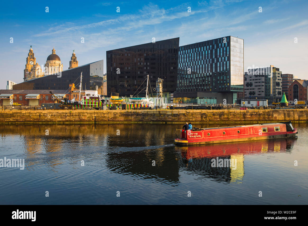 United Kingdom, England, Merseyside, Liverpool, View of Pier Head buildings reflecting in Canning Dock Stock Photo