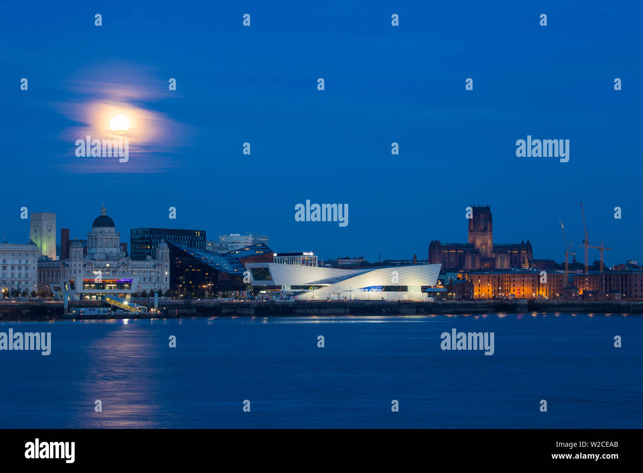 United Kingdom, England, Merseyside, Liverpool, Super moon over Liverpool skyline Stock Photo