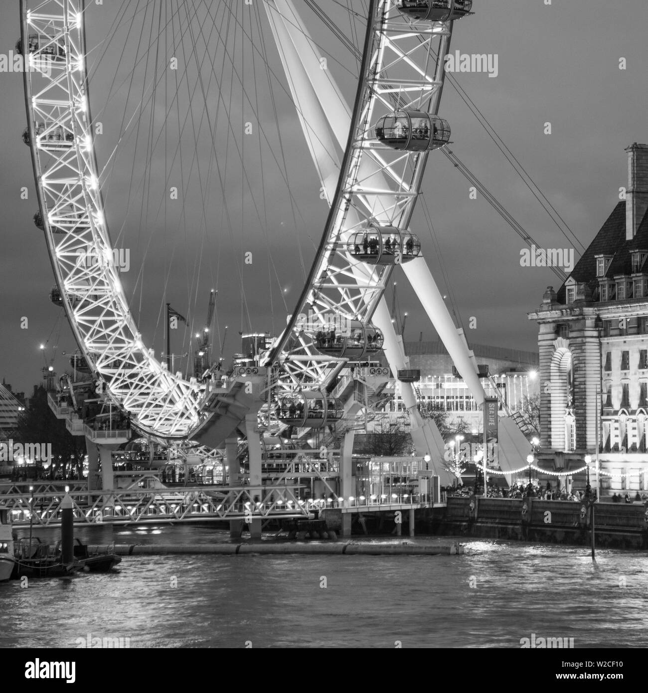 London Eye (Millennium Wheel) and former County Hall, South Bank, London, England Stock Photo
