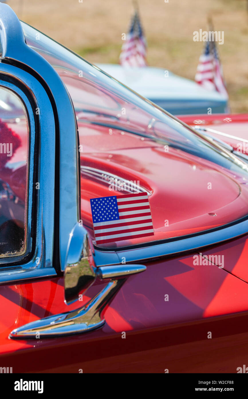 USA, Massachusetts, Cape Ann, Gloucester, antique car show, 1950s Chevrolet Impala with US flag Stock Photo