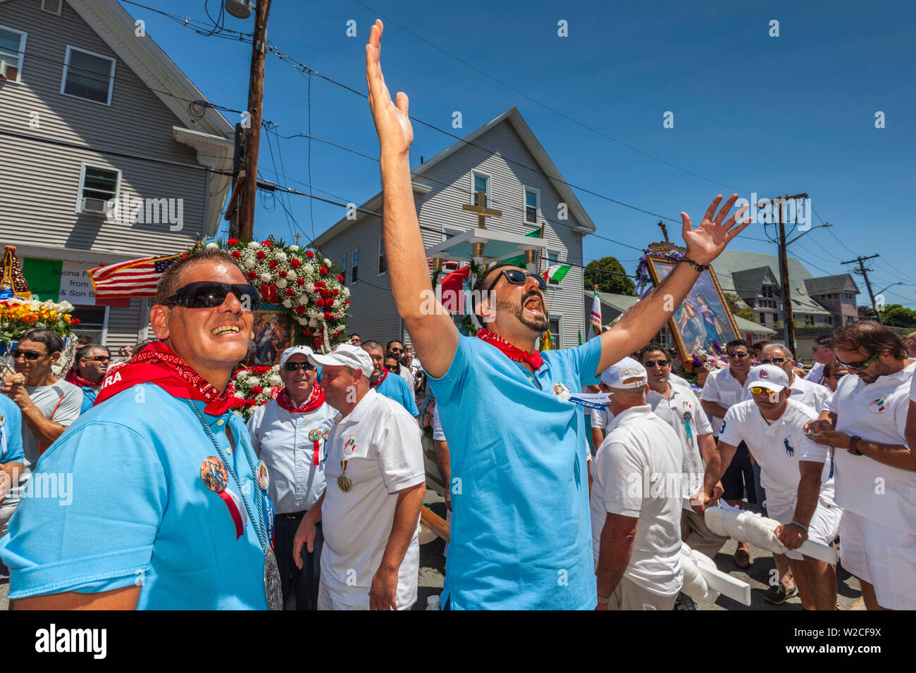 USA, Massachusetts, Cape Ann, Gloucester, St. Peter's Fiesta, Italian-Portuguese fishing community festival, religious procession, chanting to St. Peter by the Holy Family Church Stock Photo