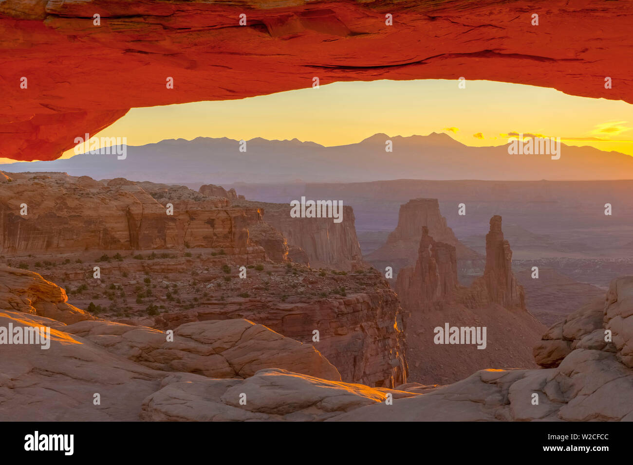 USA, Utah, Canyonlands National Park, Island in the Sky District, Mesa Arch, Sunrise Stock Photo