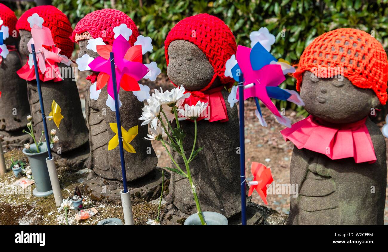 Jizo statues with red caps, protective deities for deceased children