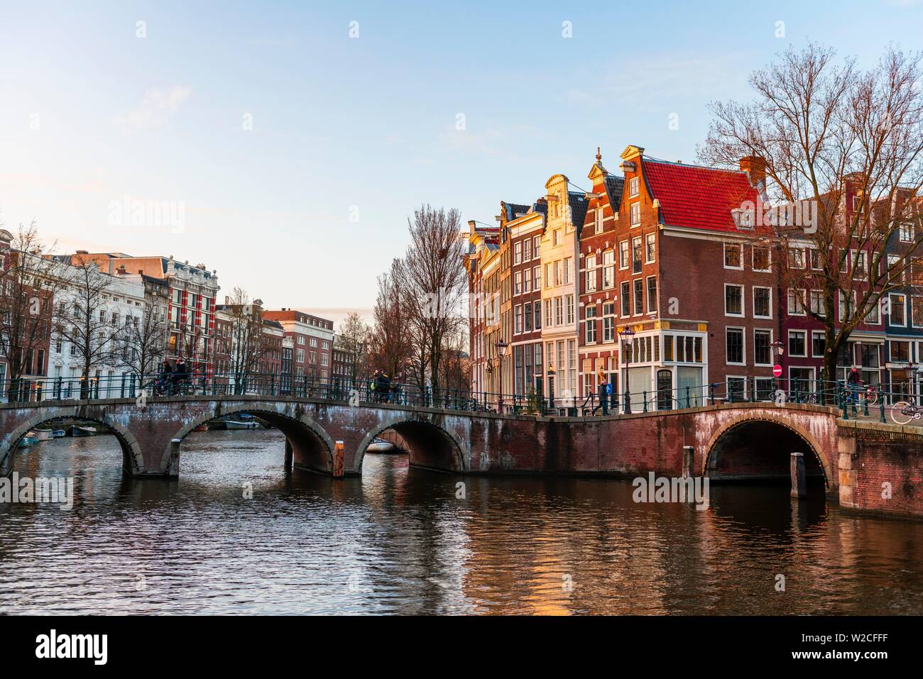 Evening atmosphere, canal with bridge, Keizersgracht and Leidsegracht, canal with historic houses, Amsterdam, North Holland, Netherlands Stock Photo