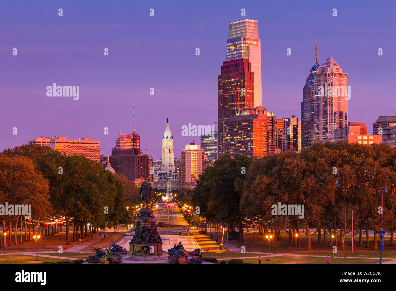 USA, Pennsylvania, Philadelphia, city skyline from the Benjamin Franklin Parkway, dusk Stock Photo