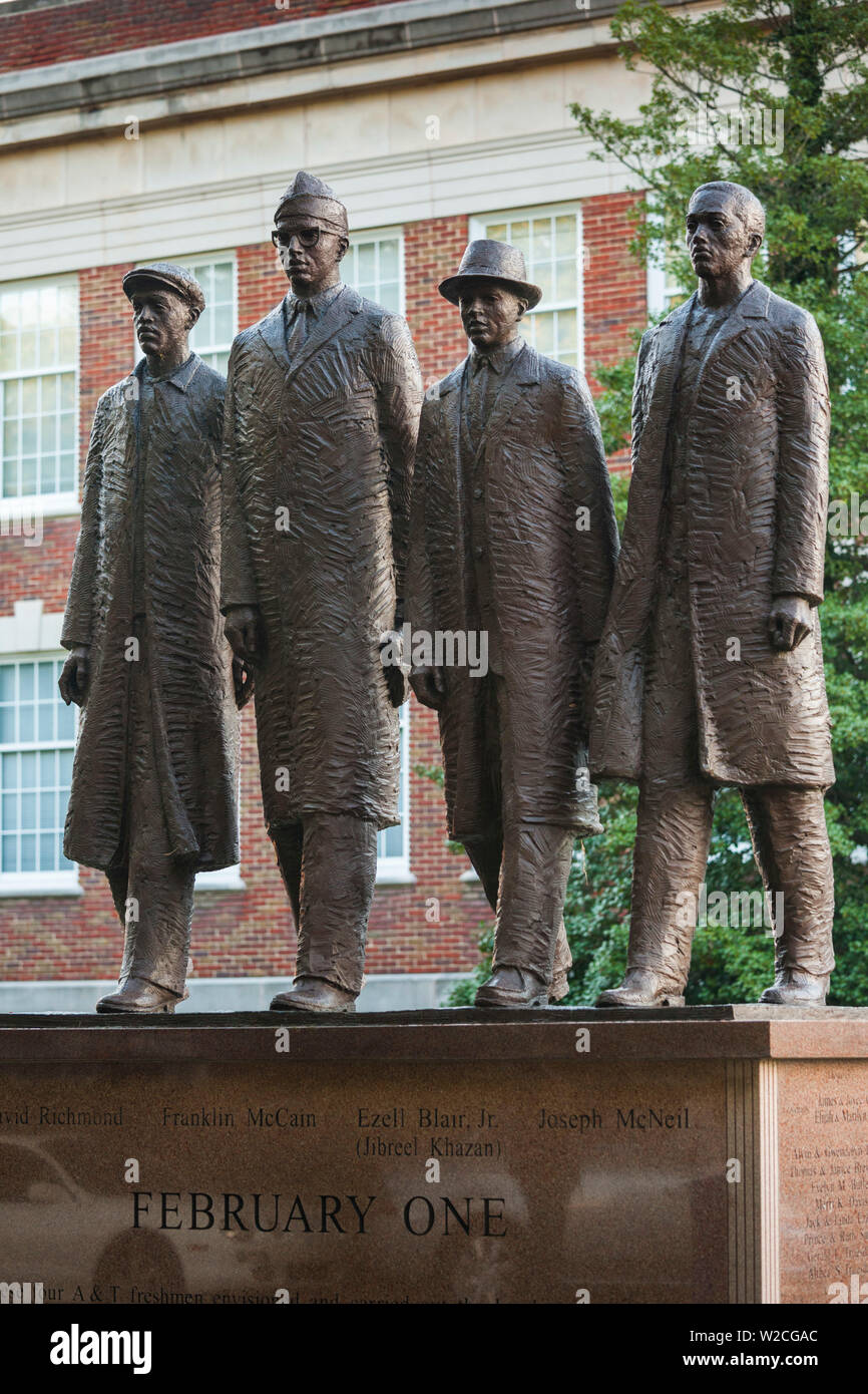 USA, North Carolina, Greensboro, statue of the Greensboro Four,  students who staged a sit-in at a Woolworth's lunch counter in 1960 which lead to desegragation during the US civil rights struggle of the early 1960s Stock Photo