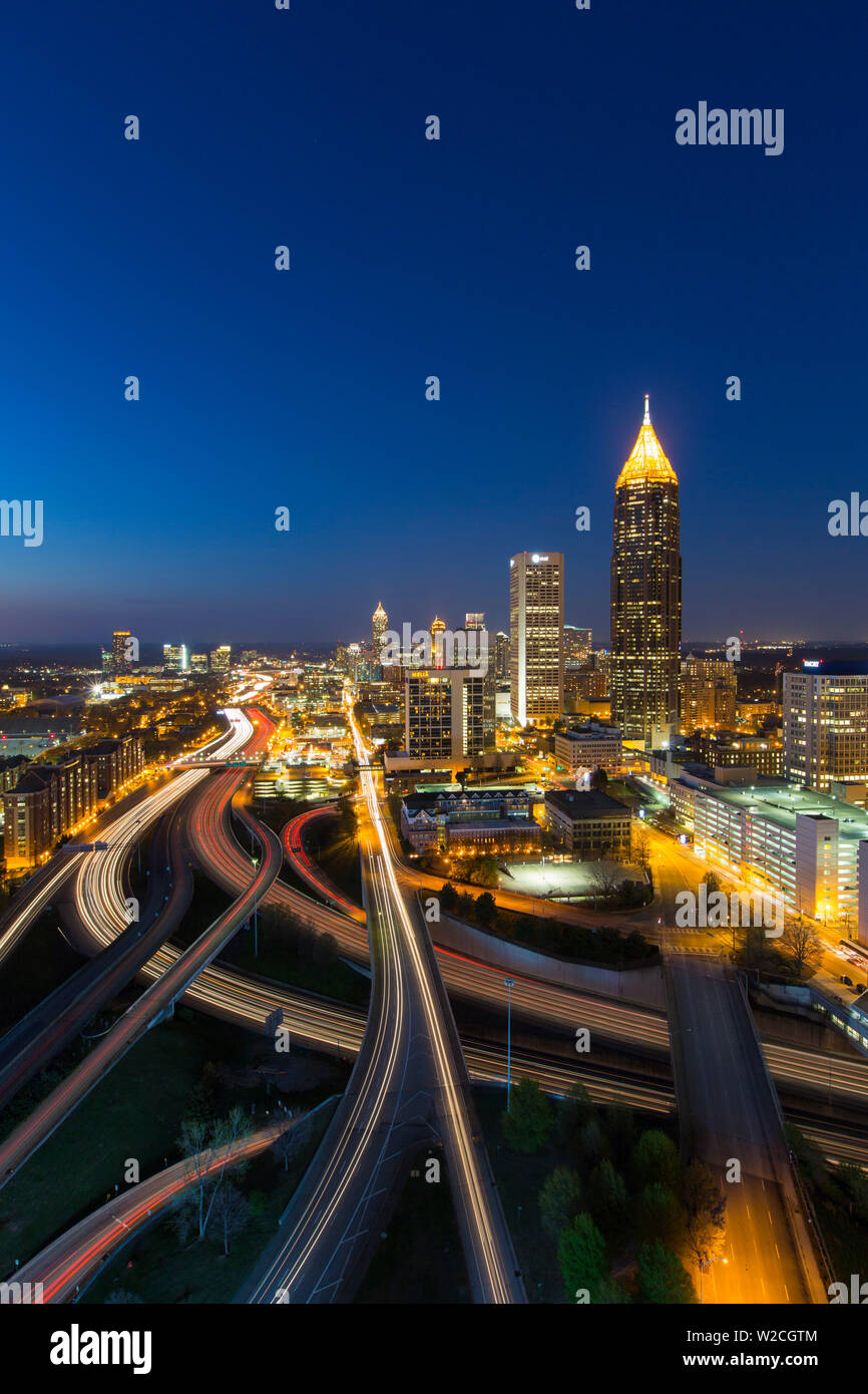 Elevated view over Interstate 85 passing the Midtown Atlanta skyline, Georgia, United States of America Stock Photo