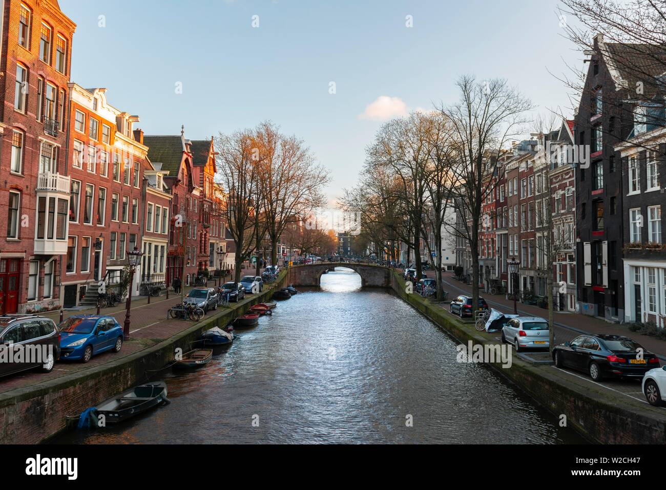 Canal with boats and historic houses, Amsterdam, Holland, Netherlands Stock Photo