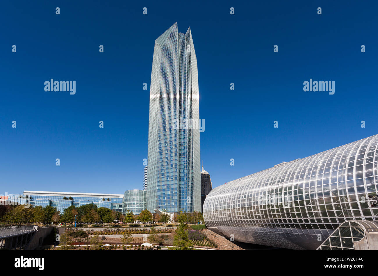 USA, Oklahoma, Oklahoma City, Devon Tower, tallest building, built 2012 and the Myriad Botanical Gardens Stock Photo