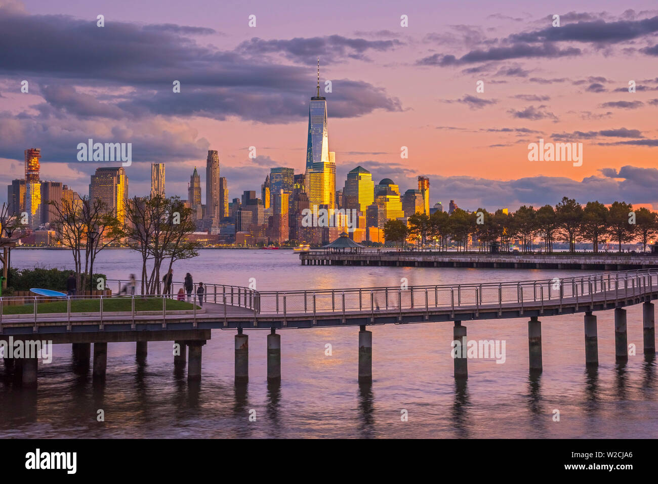 USA, New York, Manhattan, Lower Manhattan and World Trade Center, Freedom Tower across Hudson River from Pier C Park, Hoboken, New Jersey Stock Photo