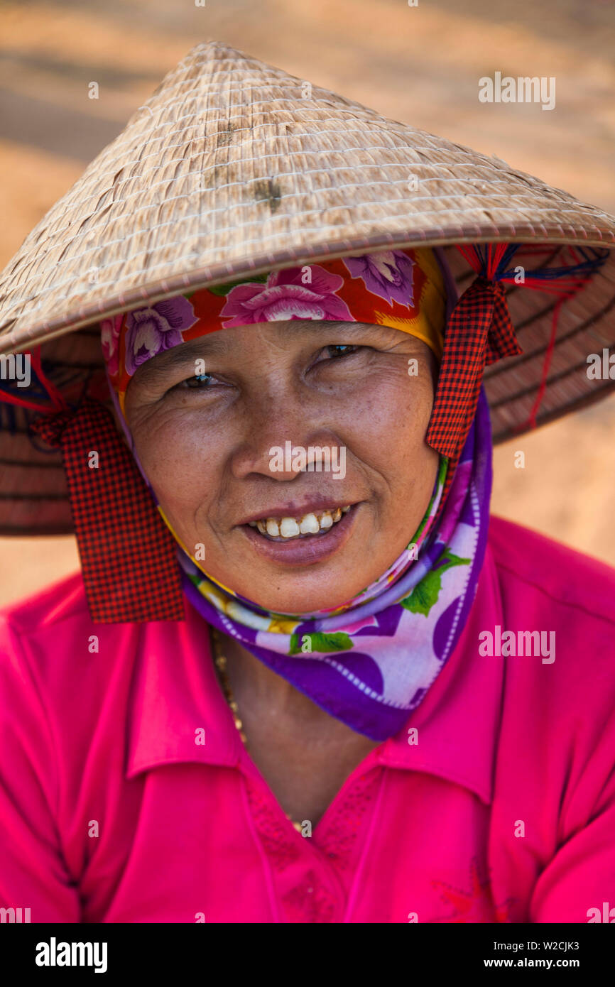 Vietnam, Dien Bien Phu, city market, older woman vendor Stock Photo