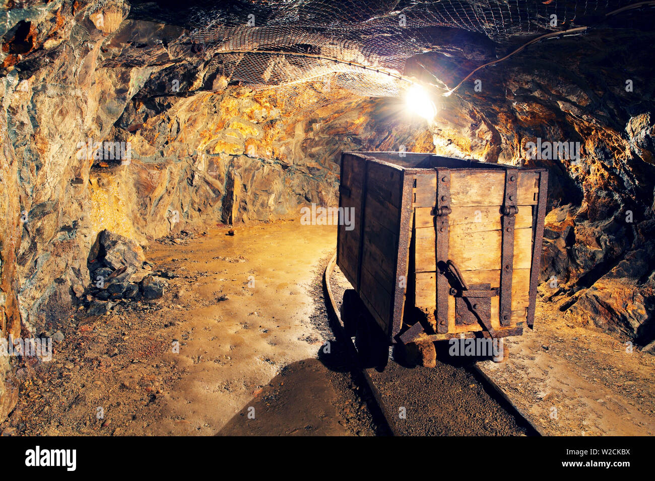 Mine gold underground tunnel railroad Stock Photo