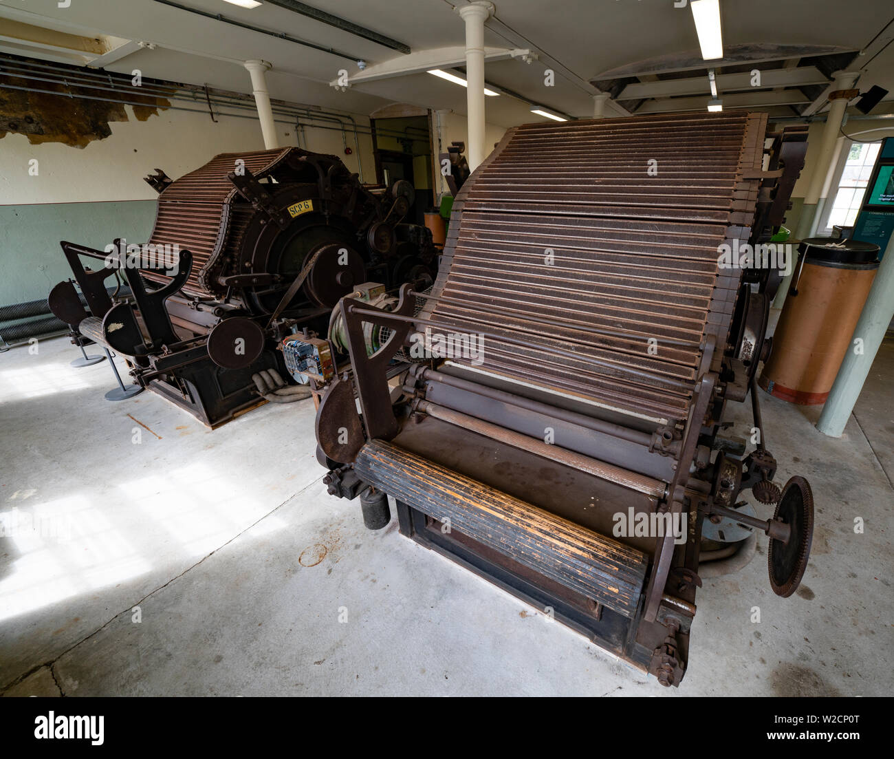 Old cotton carding machines inside preserved Stanley Mills  former cotton mills factory in Stanley, Perthshire, Scotland, UK Stock Photo