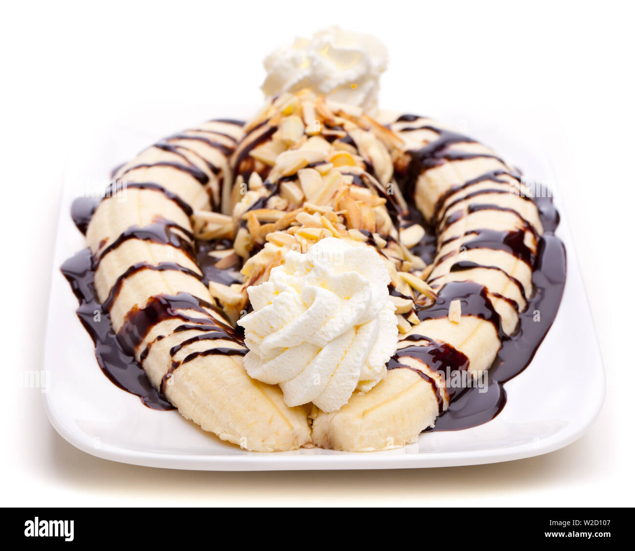 ice cream sundae: A banana split from front side isolated on white background Stock Photo