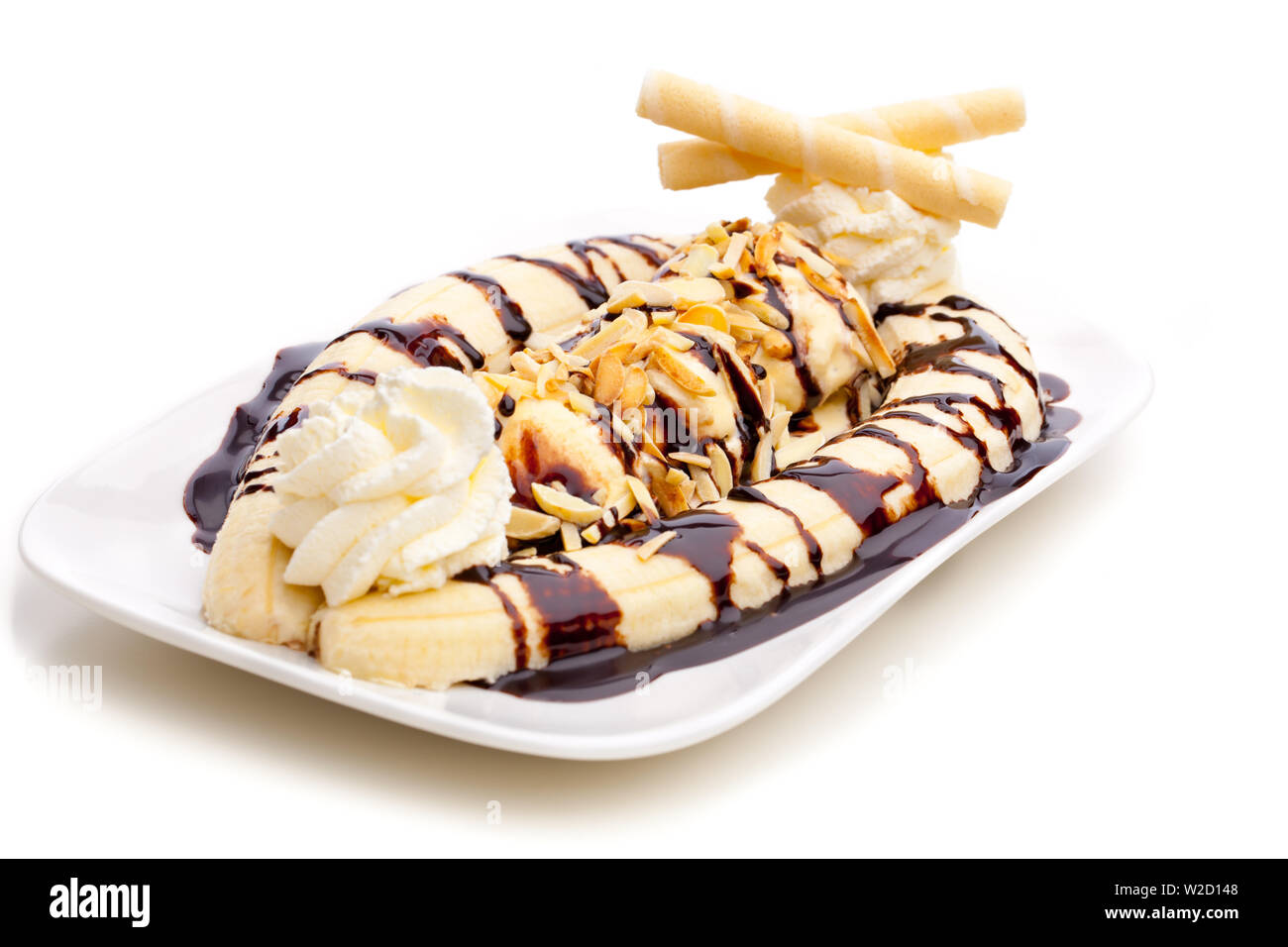 ice cream sundae: A banana split with ice cream cones isolated on white background Stock Photo