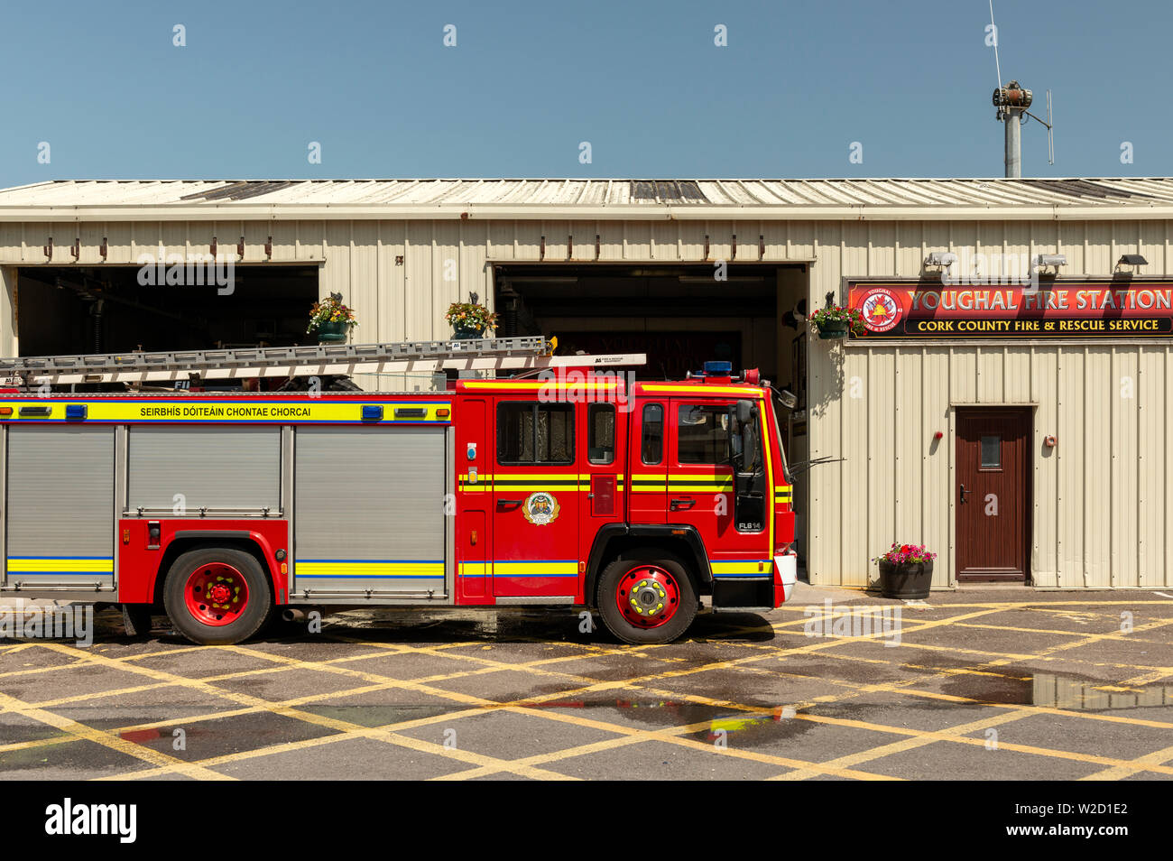 The Youghal Fire Station and fire truck on sunny day in Youghal, County Cork, Ireland Stock Photo