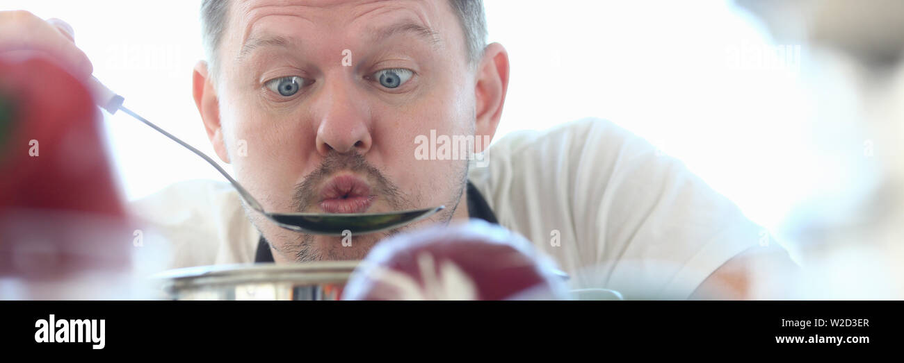 Funny Face Vlogger Chef Blowing Kitchen Spoon Stock Photo