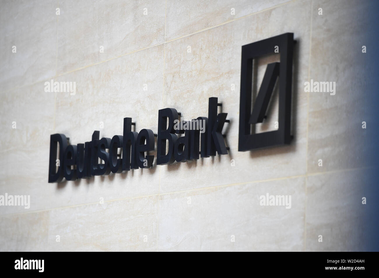 Sign at the London office of Deutsche Bank which has confirmed plans to cut 18,000 positions across its global business, causing thousands of workers in the City of London to fear for their jobs. Stock Photo