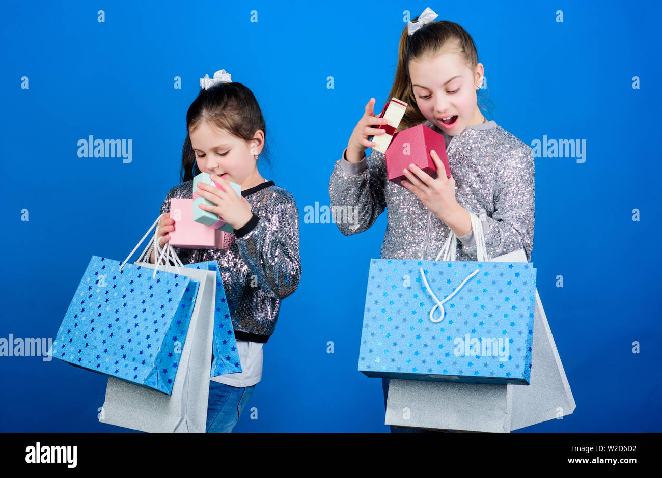 Shopping Day Kids Fashion Girls Sisters Friends With Shopping Bags Blue Background Every Product Delivered To You Shopping And Purchase Black Friday Sale And Discount Children Bunch Packages Stock Photo Alamy