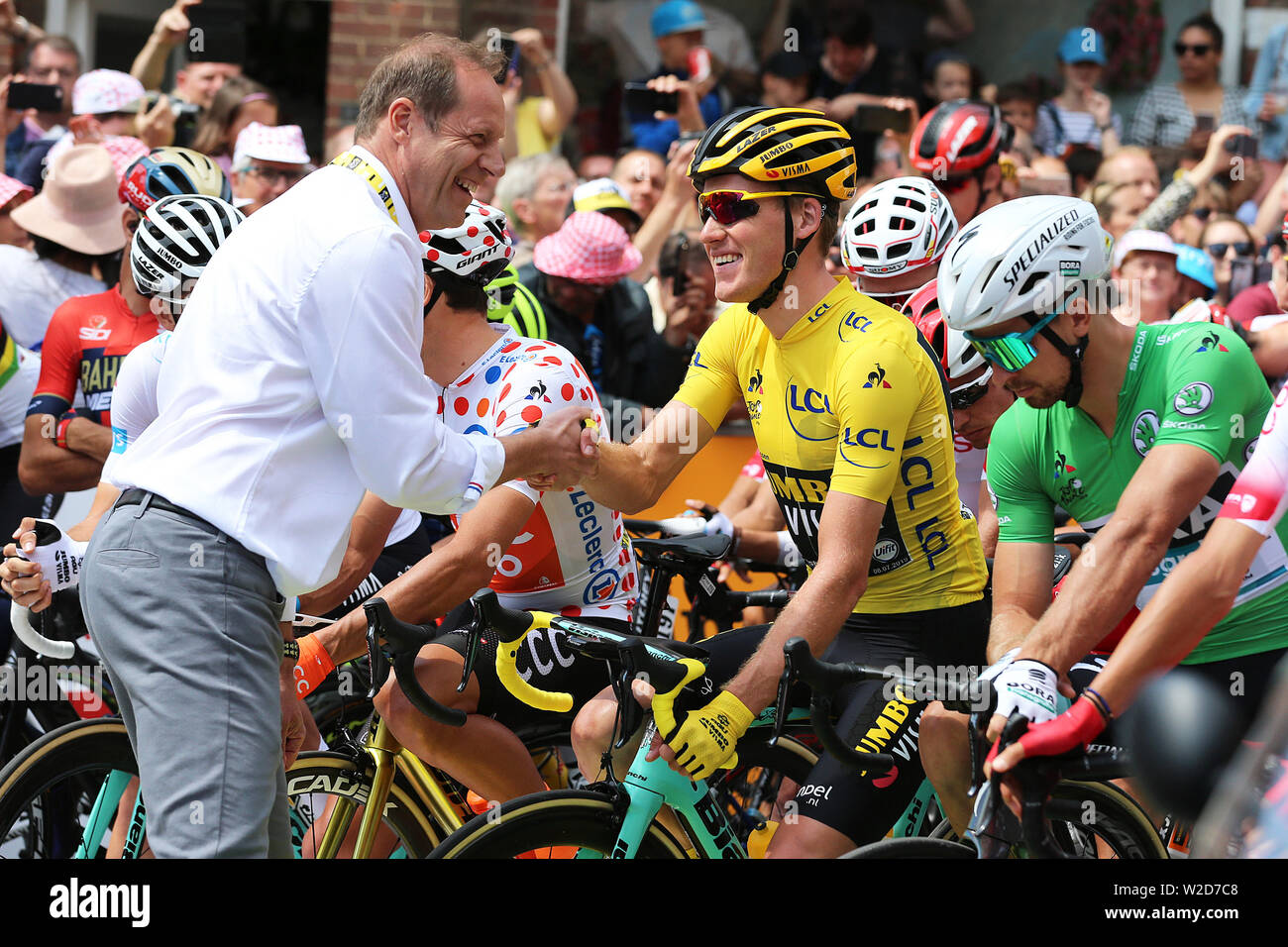 Epernay, France. 08th July, 2019. Epernay - 8-07-2019, cycling, Stage 3, etappe 3 Binche-Epernay, Christian Prudhomme shakes Mike Teunissen's hand Credit: Pro Shots/Alamy Live News Stock Photo