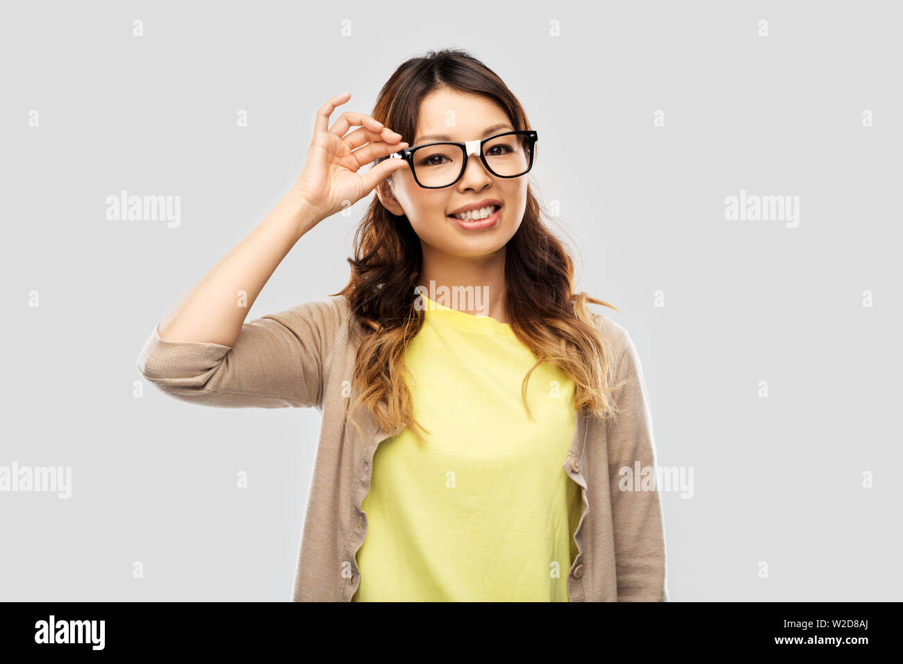 Old asian woman with glasses hi-res stock photography and images - Alamy