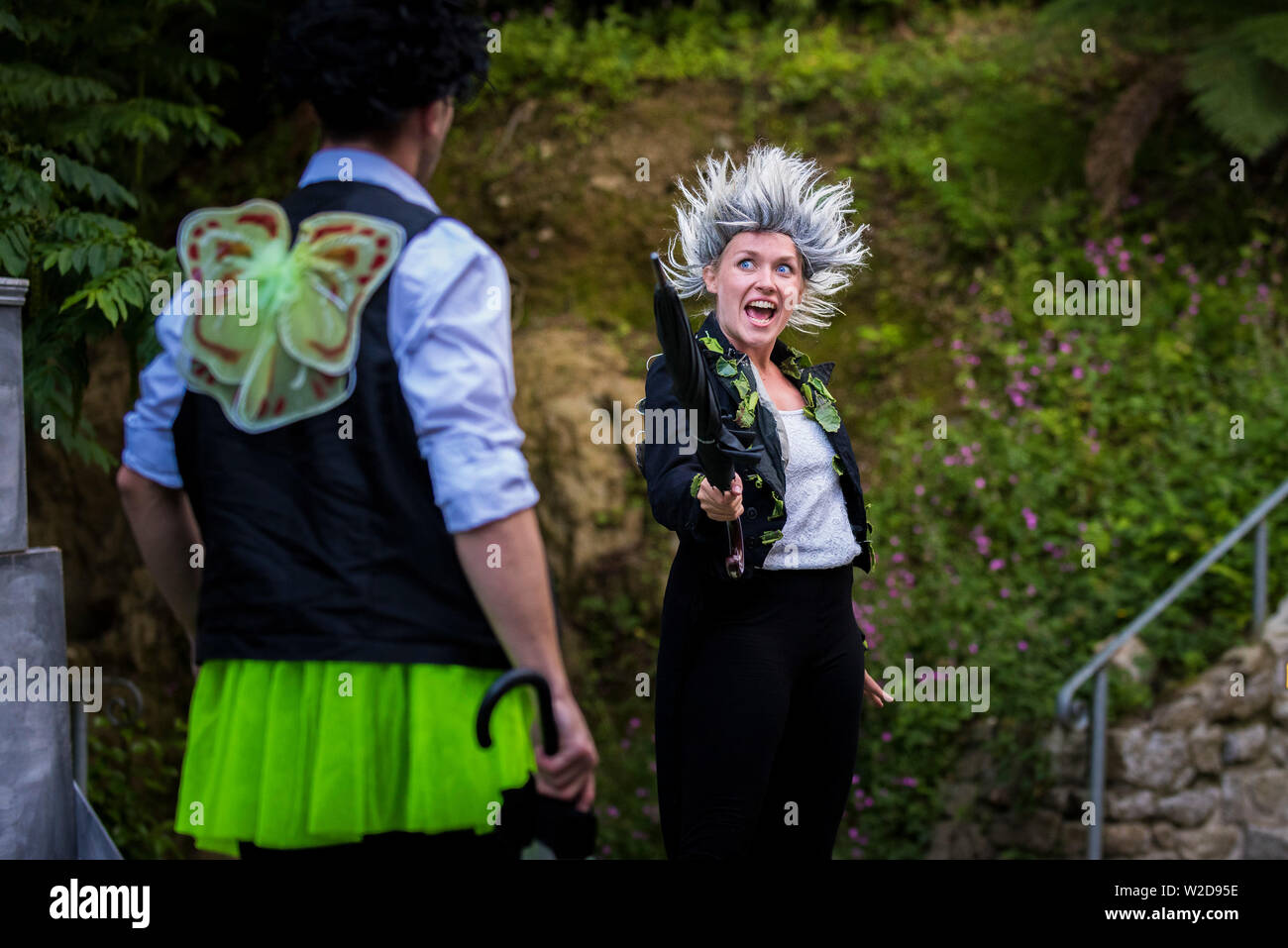 Actors performing in Shakespeare's ‘A Midsummer Night’s Dream’ at Trebah Garden Amphitheatre in Cornwall. Stock Photo